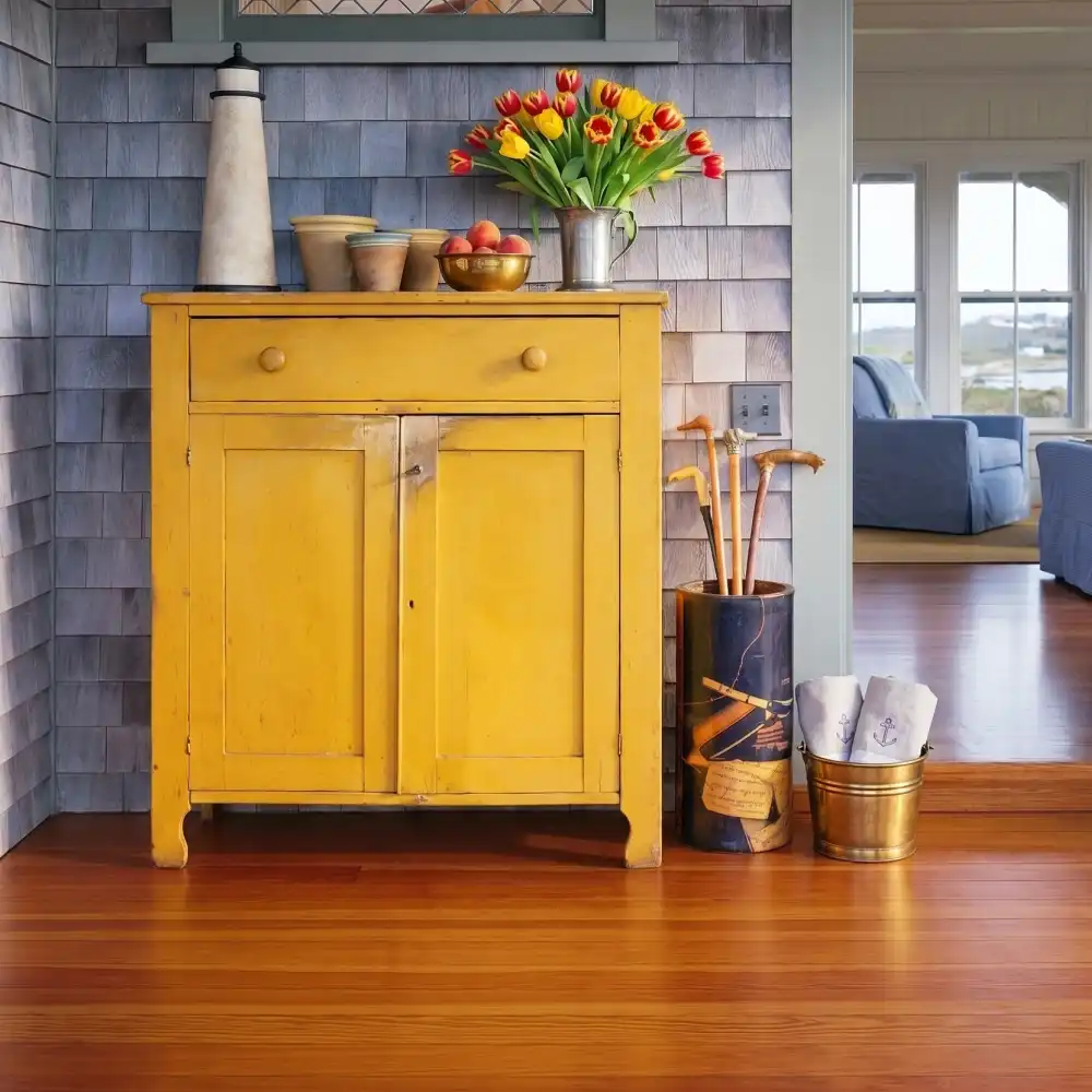 Vertical grain heart pine flooring showcases a tight, beautiful pattern and characteristic amber color variations. With minimal knots and signs of aging, it's perfect for creating a sophisticated and formal ambiance in any space.