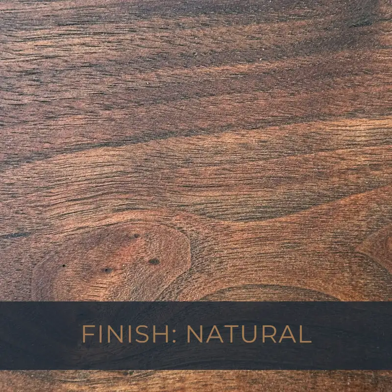 Close-up of walnut wood grain with a clear natural finish highlighting rich dark tones.