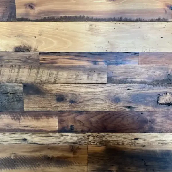 Close up shot of reclaimed barn wood flooring with a rich tactile texture.