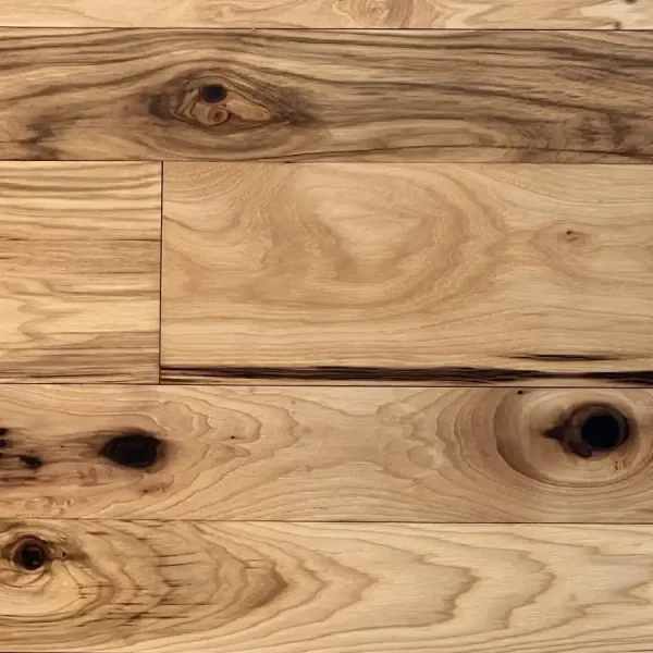 Character grade hickory flooring featuring sound nots and mineral streaking.