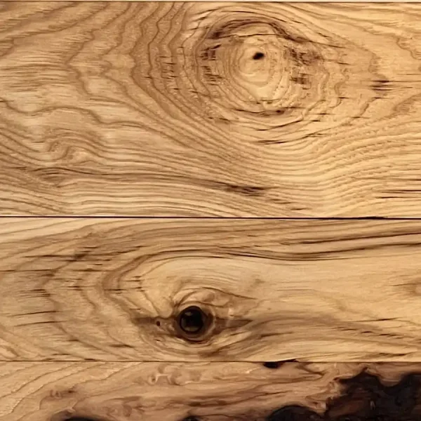 Close-up of Rustic Hickory flooring showcasing dynamic grain patterns, sweeping lines, and authentic solid knots.