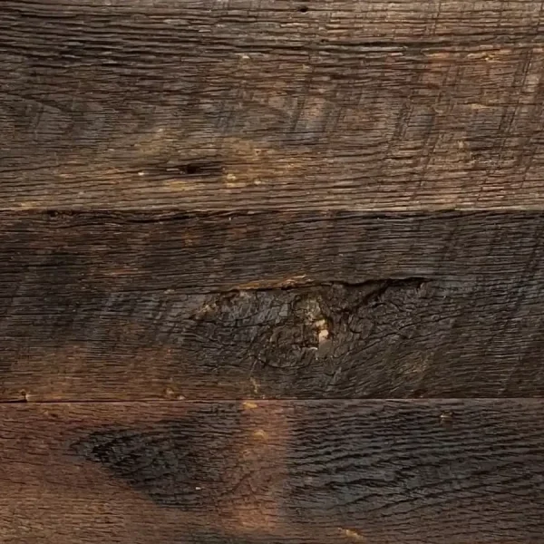 Close-up of antique original face oak planks emphasizing the tactile finish and deep wood grain.