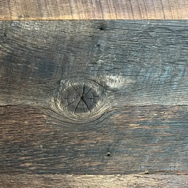 Close-up of Antique Vintage Thresher oak flooring highlighting authentic sound knots and natural voids.